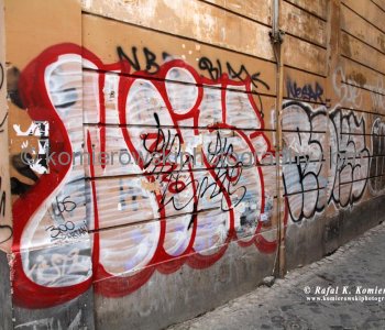 Romes graffiti-coated buildings near Ponte Sisto, the other side of Rome