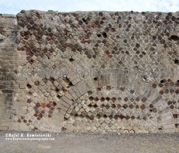 Brick wall: these patterns of construction depended on lime mortar to hold the elements together.