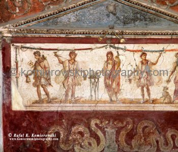 An original Pompeii fresco in the hall of a Roman tavern