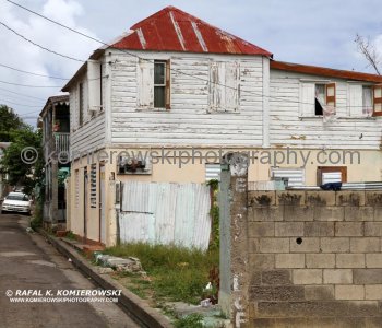 The name Basseterre in French means -low land- which most of the commercial district certainly is; it has been flooded several times