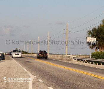 The original construction of the Overseas Highway used many of the bridges of the former railroad, including truss bridges, where the roadway was built on top of the trusses...