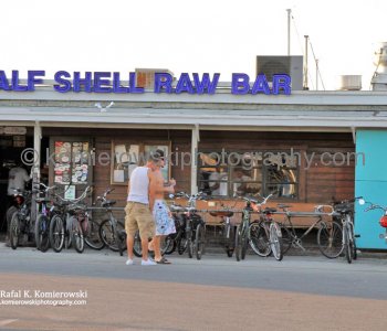Much of the highway is lined with an endless string of  bars, shops and motels...