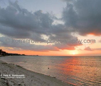 Sunrise in Key West observed from the beach  at the end of White Street and Pier
