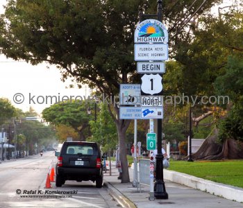 The southern end of the 2377-mile (3825 km) long U.S. Highway 1 is in Key West. The highway begins in Maine at the Canadian border and travels along the east coast of the United States. This is mile marker 0 at the southern tip of the continental U.S.