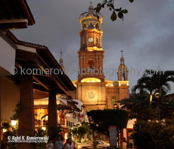 Rising above the town square is the landmark steeple of the Cathedral of Our Lady of Guadalupe. Puerto Vallarta, Mexico