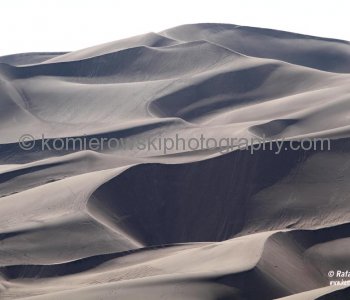 All of the above factors (deposited sand by creek and winds) are responsible for the tallest dunes in North America.