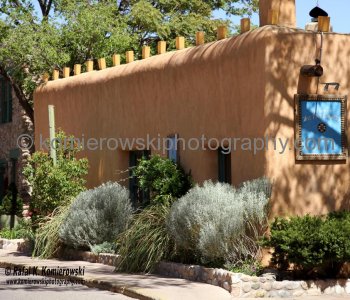 Few true adobe homes remain in modern Santa Fe. The majority are imitation adobe made of stuccoed concrete.