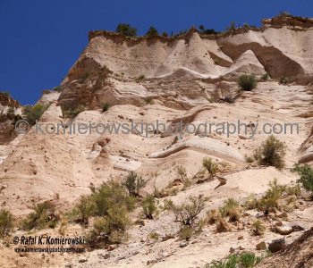 The hoodoos, erosional cones, and pedestal rocks that characterize Tent Rocks form as the result of differential erosion ..