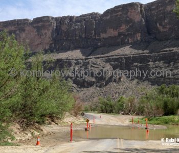 ....spring water run off crossing paved access road....Big Bend NP