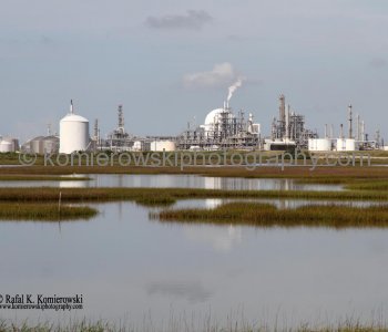 Texas leads the nation in petroleum refining and chemical products production, and is a global leader in the closely related petrochemical industry. Oil Refinery near Freeport, Texas