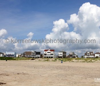 Homes atop tall concrete or wooden stilts. They are built to withstand hurricane winds as well as the most severe flooding