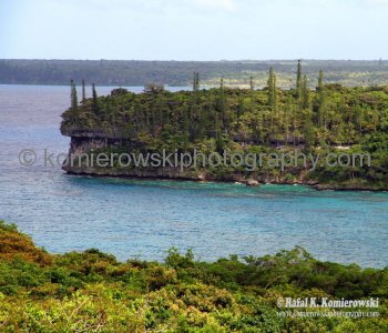 Lifou.....many limestone caves and  white beaches with coral reefs are teeming with brightly coloured marine... life