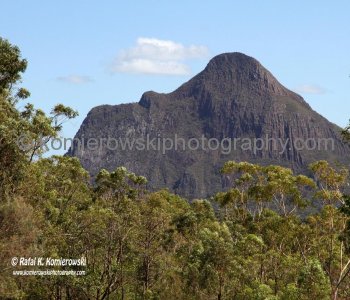 Glass House Mountains are a series of steep-sided volcanic plugs which dominate the landscape of the Sunshine Coast Hinterland