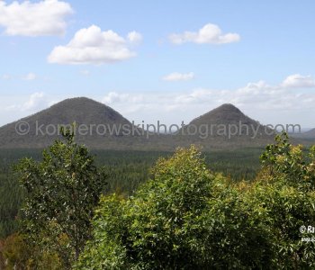 GHM...formed of rhylite and trachtyte, lavas which hardened inside the vents of tertiary volcanoes that have been greatly reduced by about 25 million years of erosion