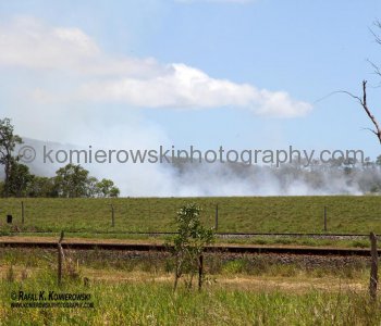 ...pre-harvest sugar cane burning to try to control pests on sugar cane crops. Bruce Highway....