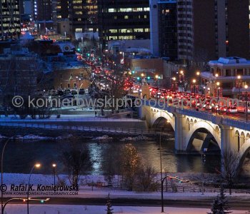 View of Center Street Bridge (at sunrise)  from Rotary Park above Memorial Drive NE, Center Street and Bow River.