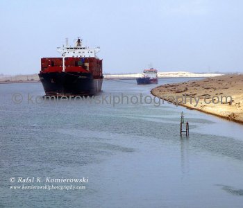 Ships transit the Suez  Canal in Convoys ...