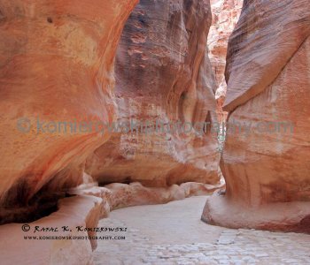 A waterway carved into the wall runs the entire length of the Siq